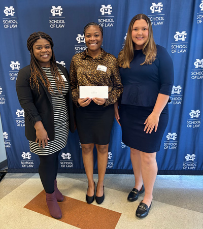 Faith Hall, a first-year law student at Mississippi College School of Law in Jackson, Mississippi, has been awarded the Cosmich Simmons & Brown Diversity in the Law Scholarship. The scholarship was presented by CSB attorneys Amorya Orr and Brianna Bailey during the MC Law Awards Ceremony held on Thursday April 11, 2024.